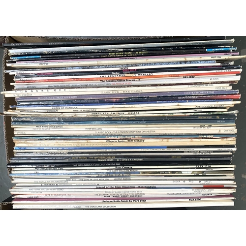 292 - A mixed box of vinyl LPs to include rock and pop, mainly from the 70s and 80s to include The BeeGees... 