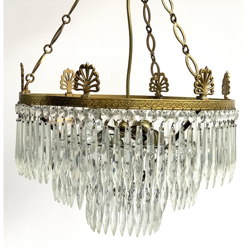 314 - A three tier gilt metal chandelier with cut glass drops, 39cmD