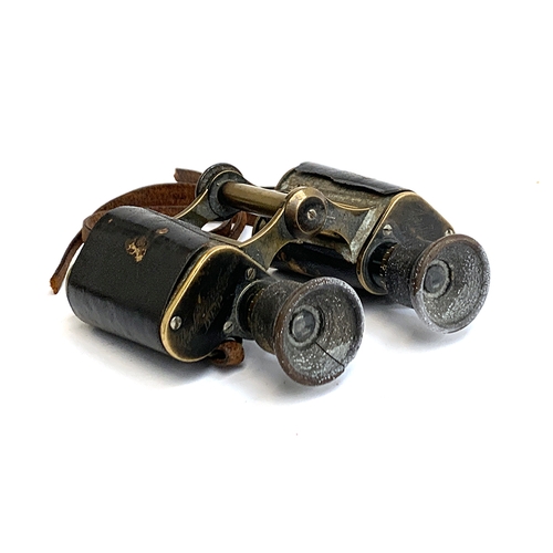 559 - A pair of Carl Zeiss WWI Feldstecher binoculars, inscribed 'Carl Zeiss Jena DRP, Feldstecher VERGR.=... 