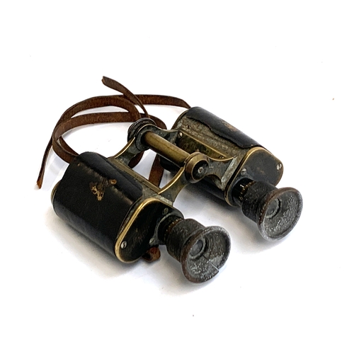 559 - A pair of Carl Zeiss WWI Feldstecher binoculars, inscribed 'Carl Zeiss Jena DRP, Feldstecher VERGR.=... 