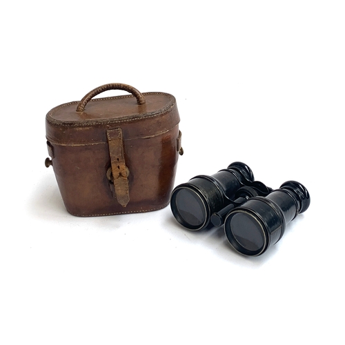 560 - A pair of early 20th century binoculars or field glasses, marked 'The MacKinnon, 7 Grace Church Stre... 