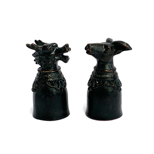 94 - Two Chinese zodiac stirrup cups, depicting the dragon and the sheep, 6cm high