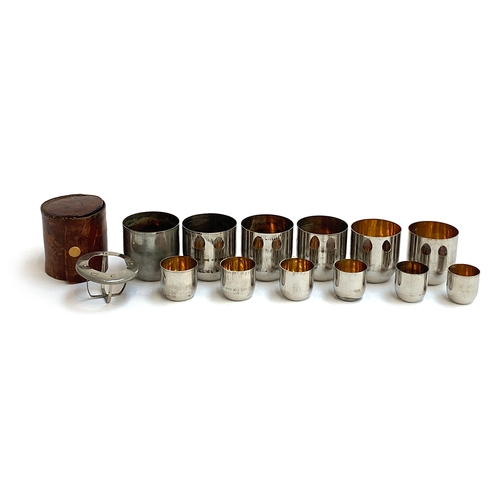 95 - A cased set of German stirrup cups comprising 6 cups and 6 shot glasses, each with gilt interior in ... 