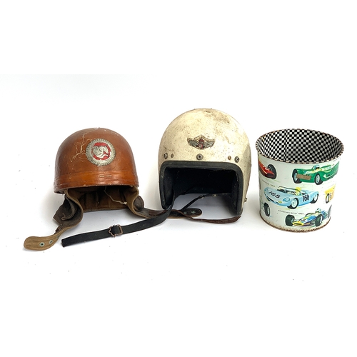 569 - A vintage motorcycle helmet with pegasus logo, together with an Owen's 'Mastergarde' 7 1/8 white cra... 