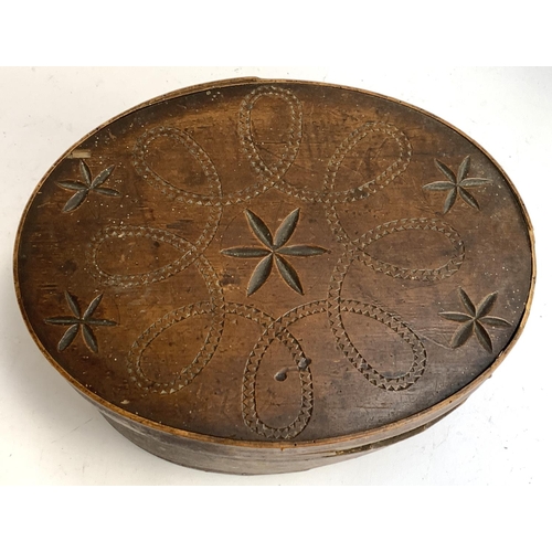 322 - A 19th century Norwegian folk art 'Tine' bentwood box, with carved decoration to lid, 38.5x29.5x18cm... 