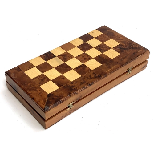 380 - A cased burr wood chess/backgammon set with pieces