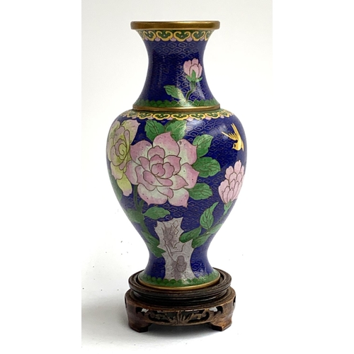 191 - A Chinese cloisonne enamel vase, on hardwood stand