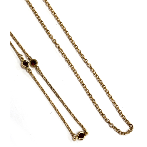 17 - A 1/20 12ct rolled gold chain, 46cmL, approx. 2.6g; together with a 9ct gold and garnet necklace (af... 