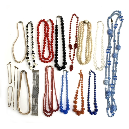 5 - A mixed lot of necklaces to include mainly early 20th century glass bead necklaces, one very long bl... 