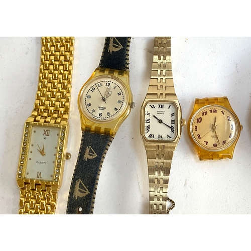 22 - A mixed lot to include jewellery boxes; vintage compacts; Omega lighter; watches including a Swatch,... 