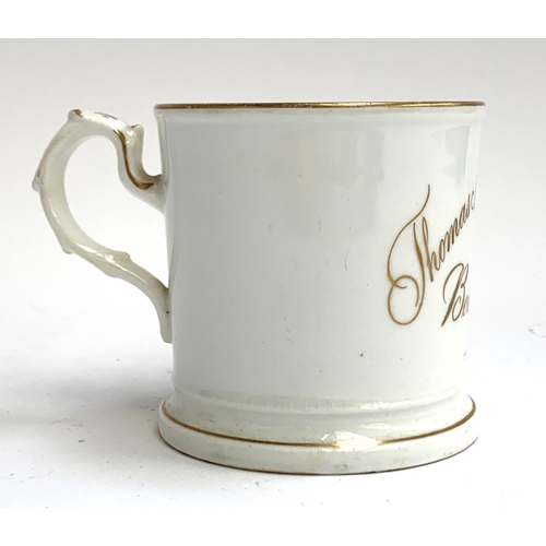 150 - A 19th century porcelain Christening cup for Thomas Arthur Jones born Oct 24th, 1861, 9.5cmH