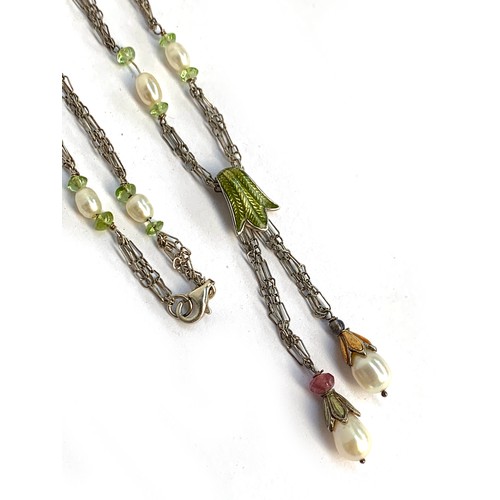 4 - A pretty silver and guilloche enamel negligee necklace, the chain with interspersed pearls and gemst... 