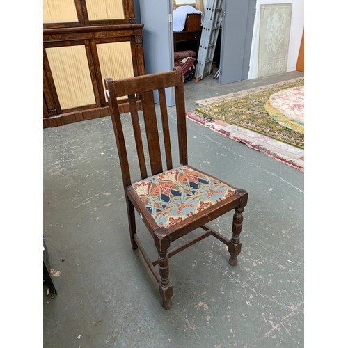 934 - An oak chair upholstered in a William Morris style fabric