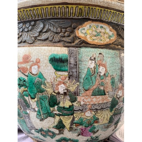 167 - A large Chinese crackle glazed stoneware and polychrome enamel fish bowl, the outside decorated with... 