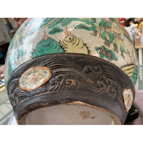 167 - A large Chinese crackle glazed stoneware and polychrome enamel fish bowl, the outside decorated with... 