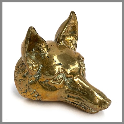 159 - A heavy brass foxmask doorstop, approx. 16cm long