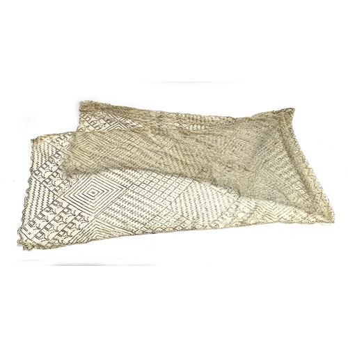 731 - A 1920s assuit shawl, 215cm long, 48cm wide