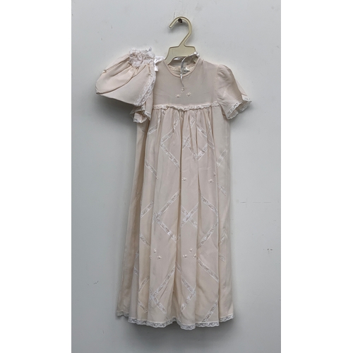 738 - A Saks, 5th Avenue silk christening gown and bonnet with cotton liner; together with a 'Rare Edition... 