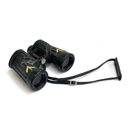 562 - A pair of military binoculars in sturdy rubber covering