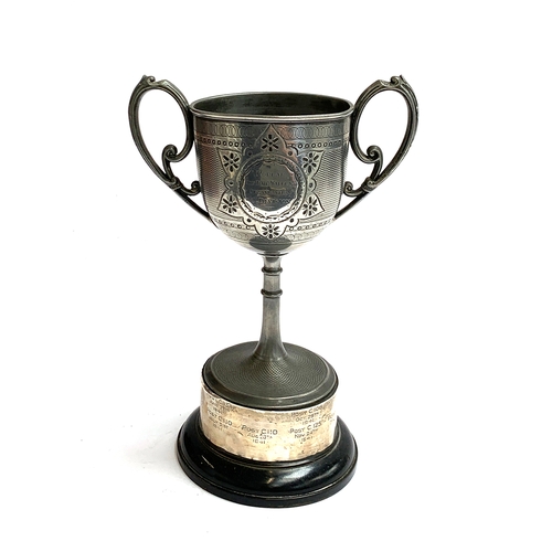 655 - A twin handled trophy cup, 'Poplar Air Raid Warden's Organisation, C Division', on ebonised plinth b... 