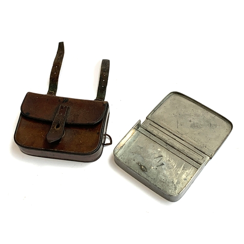 104 - A folding sandwich box in fitted leather case with saddle attachment