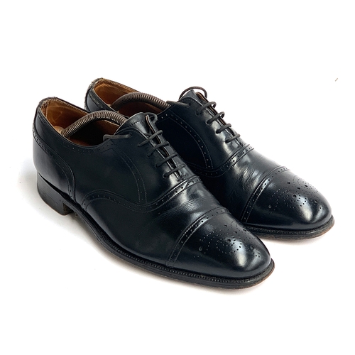 794 - A pair of Gieves & Hawkes black leather semi-brogues, size 6.5