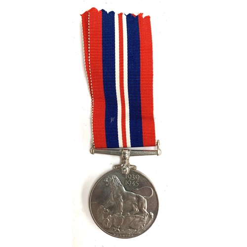 659 - A World War II service medal, possibly issued to D Beresford