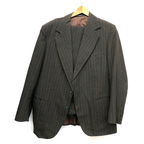 1003 - A Collier & Stanley, Manchester (1957) single breasted wool suit, the trousers with side fastening b... 