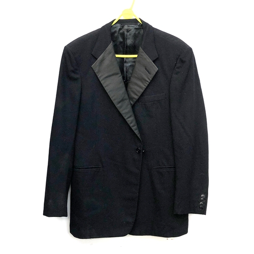 1006 - A Moss Bros wool dinner jacket, size 43R; together with a single breasted dinner jacket with shawl c... 