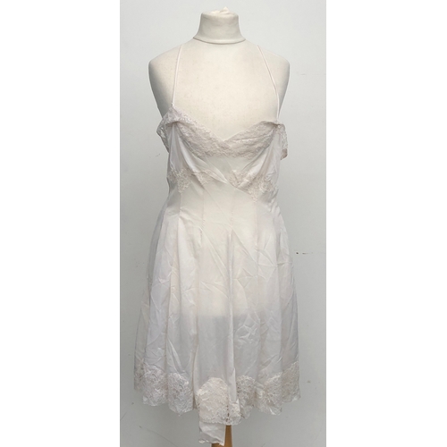 750 - A Helen Stuart vintage slip, size 36; together with two pairs of ladies undertrousers; and a wedding... 