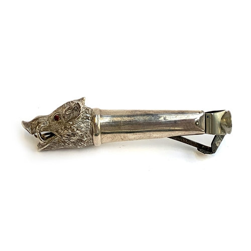 163 - A late 19th century silver cigar cutter, probably Austrian, the end modelled as a wild boar's head, ... 