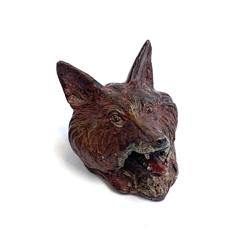 169 - A painted cast metal tabletop inkwell, modelled as a fox mask, with ceramic inkwell