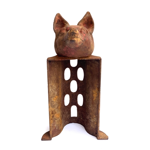 174 - A Victorian cast iron saddle rack, mounted with fox mask finial, 44cm high

Provenance: property of ... 