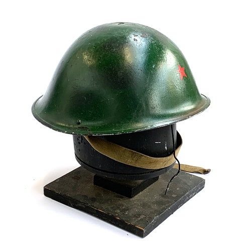 697 - British Mk 4 or 5 helmet, painted with a red star