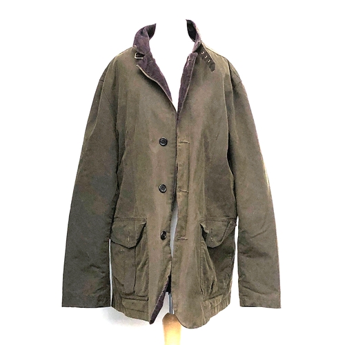 976 - A Barbour waxed cotton jacket, ladies size XL