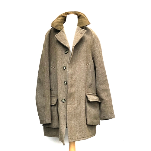 979 - A Cordings of Piccadilly shooting coat, size L, wool lined with tattersall cloth, poacher's pockets,... 