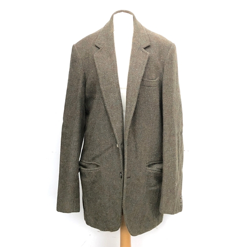 980 - A tailored Harris tweed single breasted jacket, approx. 42