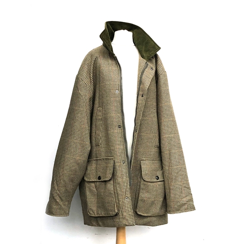 982 - A Bertie Wooster quilt lined shooting jacket, in hound's tooth tweed, with green cord collard, size ... 