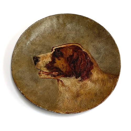 134 - A tole ware charger depicting a hound, 30cm diameter