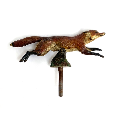 119 - A cold painted car mascot in the form of a running fox, 13cm long