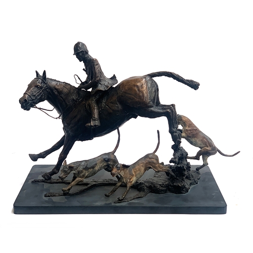 115 - Sally Rutherford (b.1940), a patinated and part cold painted bronze figure group of huntsman and thr...