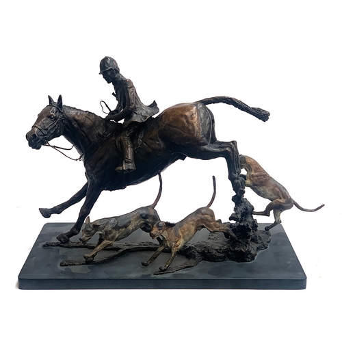 115 - Sally Rutherford (b.1940), a patinated and part cold painted bronze figure group of huntsman and thr... 