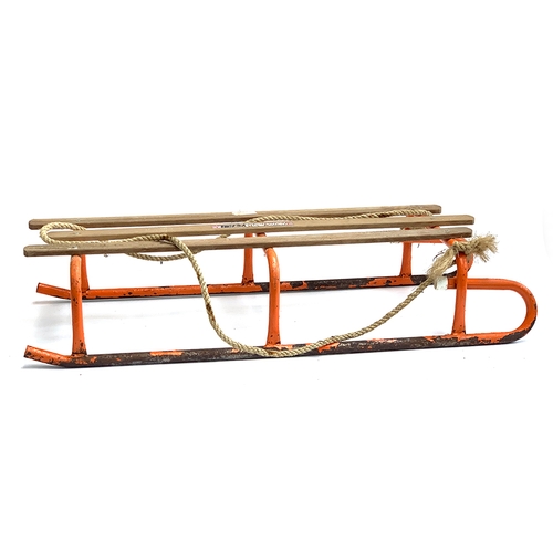 1323 - A Team Playway toboggan or sled with rope handle, 97cm long