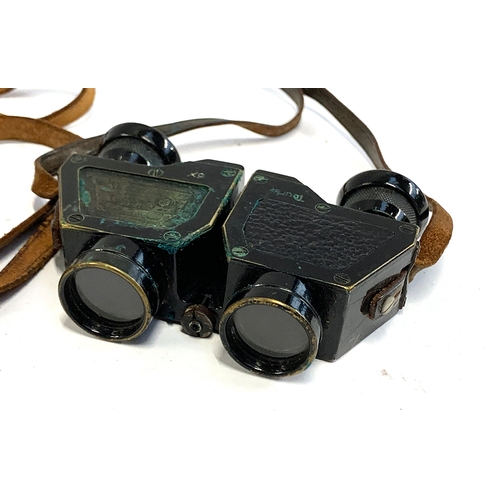 566 - A cased pair of Moeller Wedel Tourix 6X binoculars in leather case