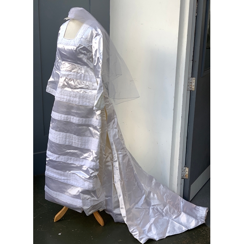 1329 - A D. H Evans wedding dress with veil