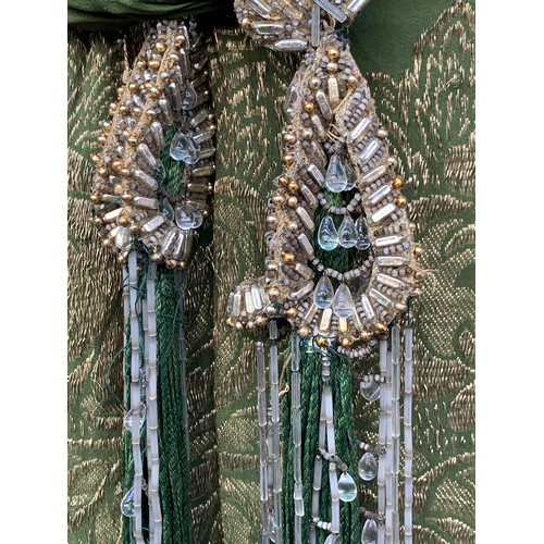 770 - A 1920's green silk and gold metallic embroidered thread flapper dress with attached tie belt compri... 