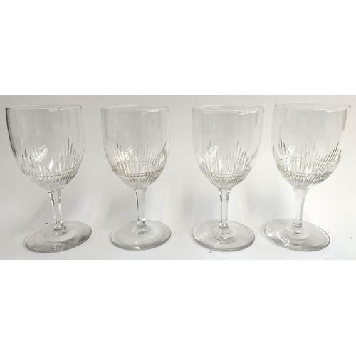 58 - A large quantity of glass and cut glass items to include a set of four wine glasses with cut decorat... 