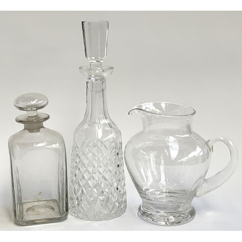 59 - A Dartington crystal jug, 19.5cm high; together with a Waterford crystal decanter, 34cm high; and on... 