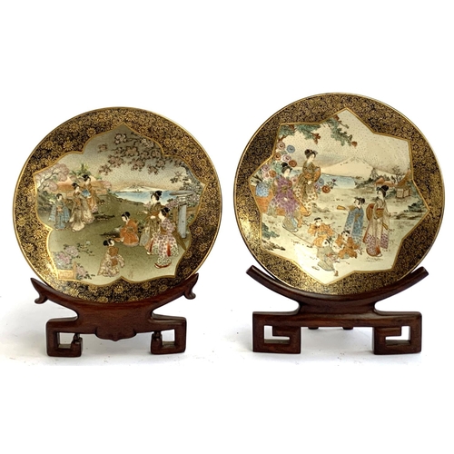 63 - A pair of Japanese satsuma plates depicting women and children with Mt Fuji in backgrounds, profuse ... 