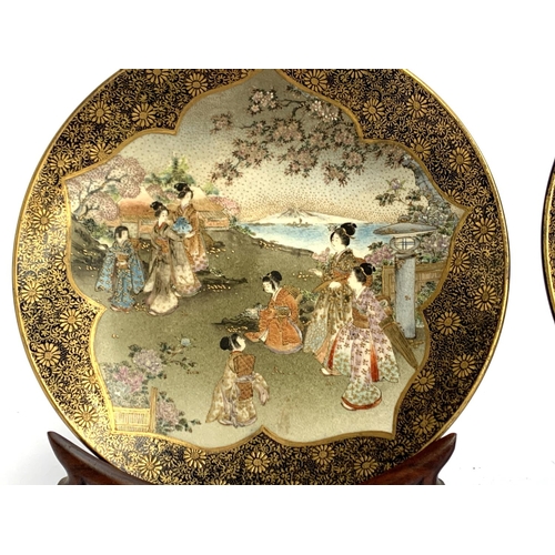 63 - A pair of Japanese satsuma plates depicting women and children with Mt Fuji in backgrounds, profuse ... 